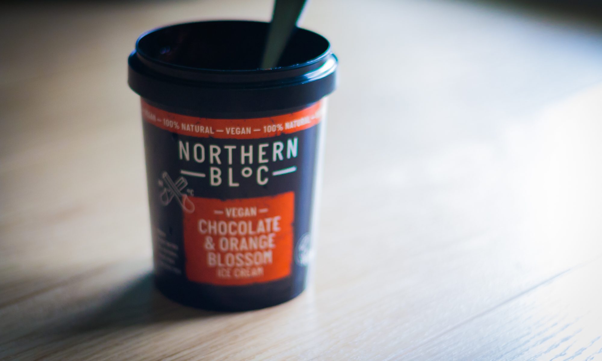 An empty tub of Northern Bloc Vegan Ice Cream